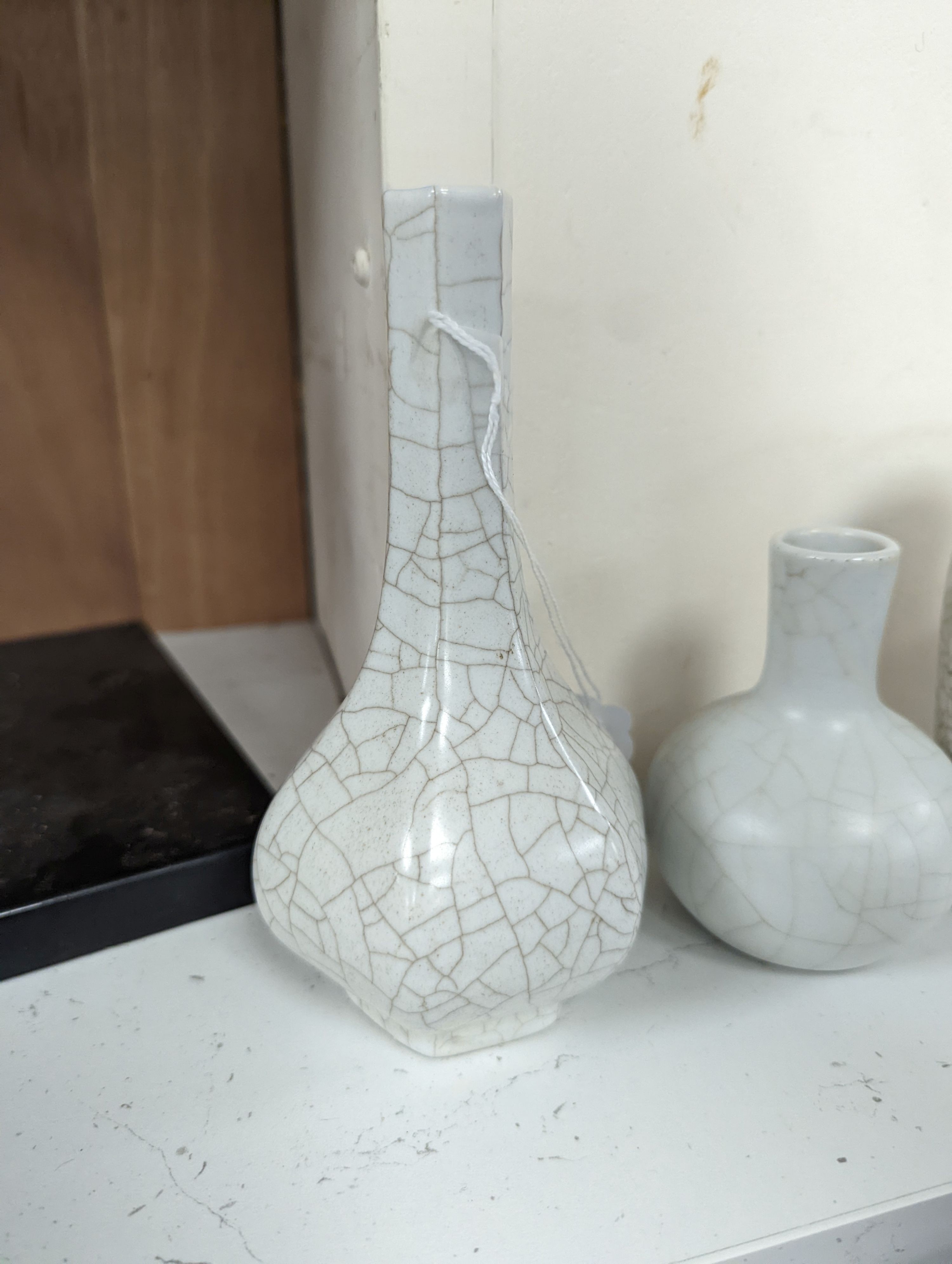 Four Chinese crackle glaze vases, tallest 16 cms high.